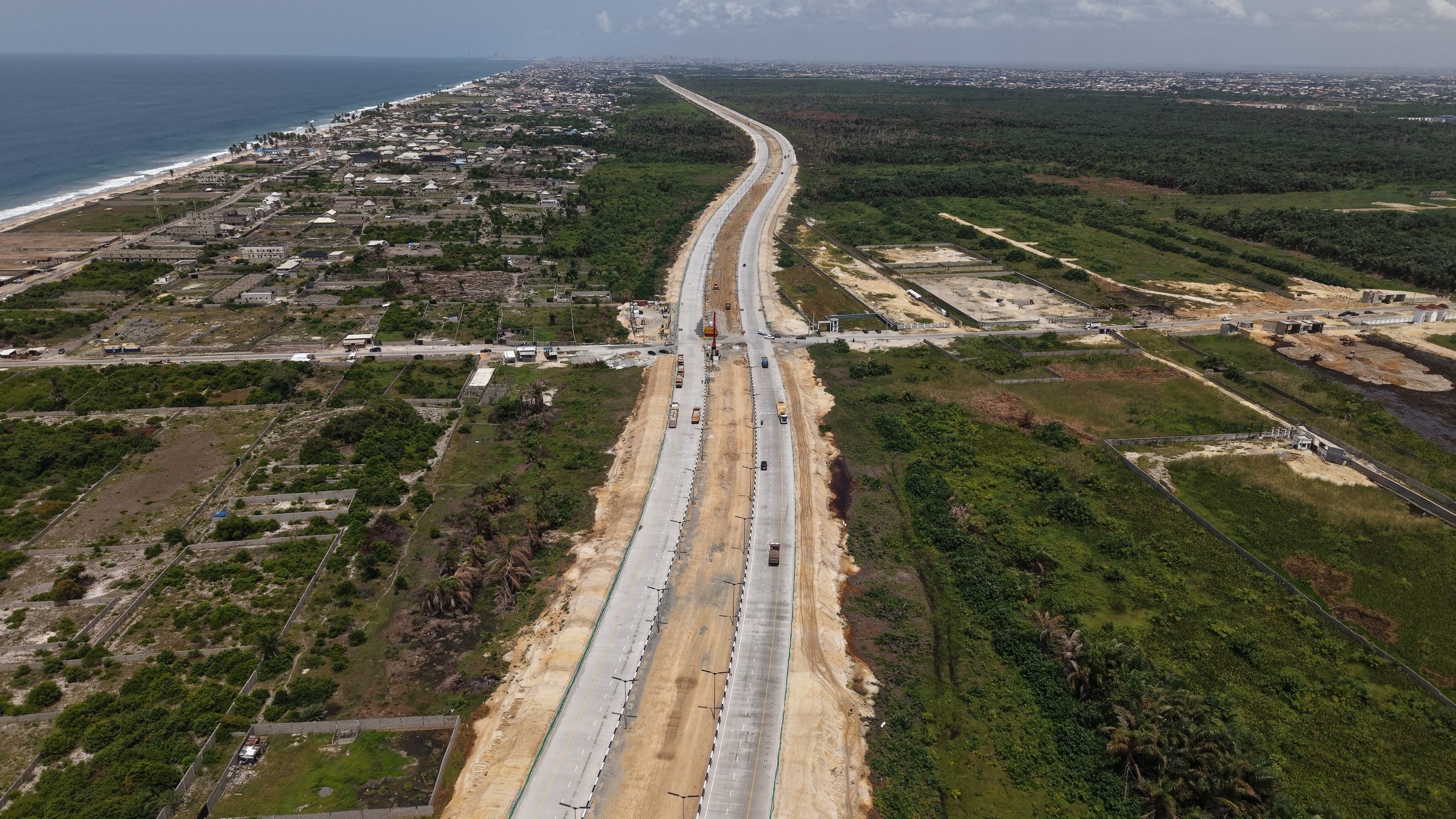 Aerial view of the Lagos-Calabar Coastal Highway running beside the Lagos coastline